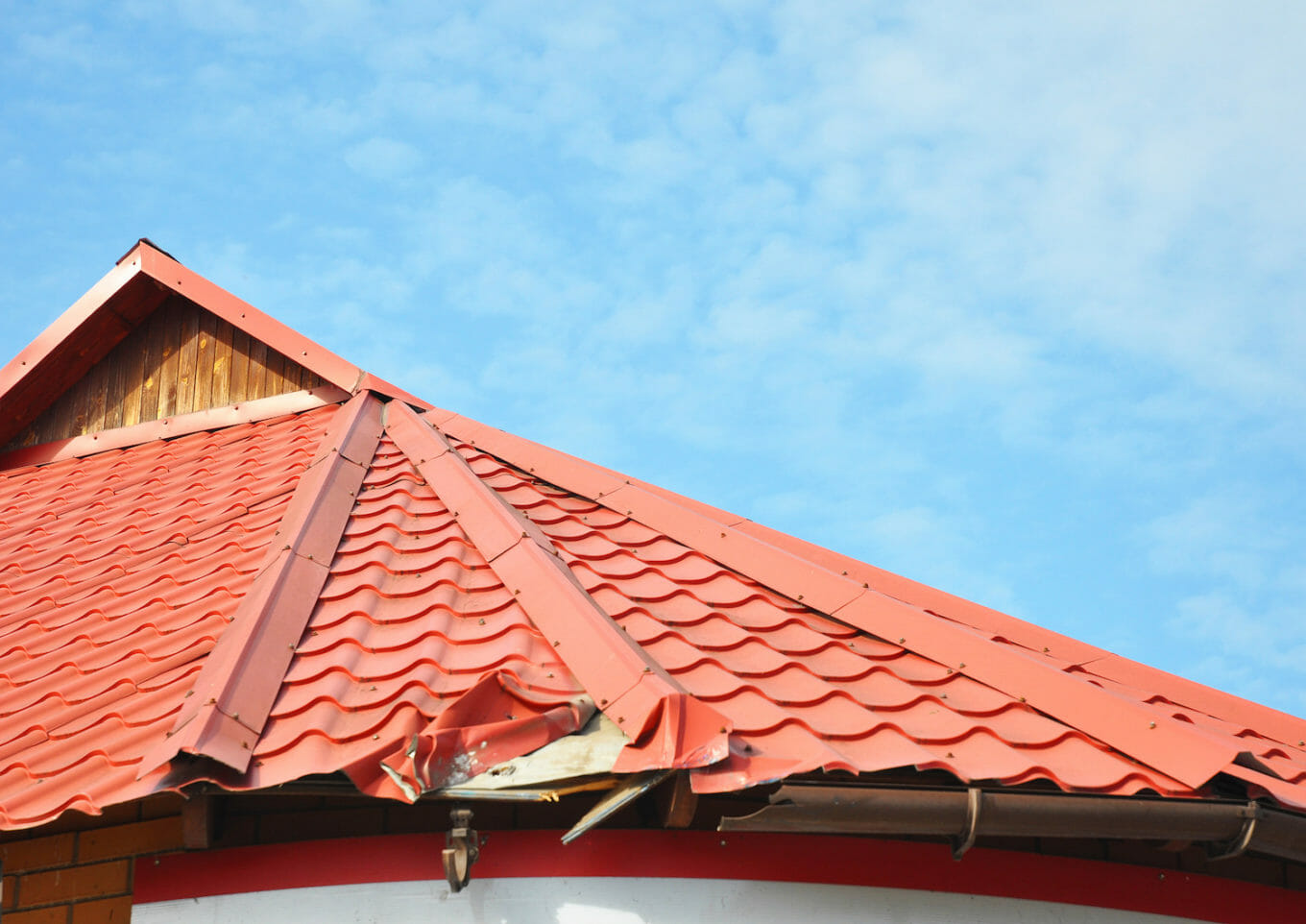 how to repair metal roof damage